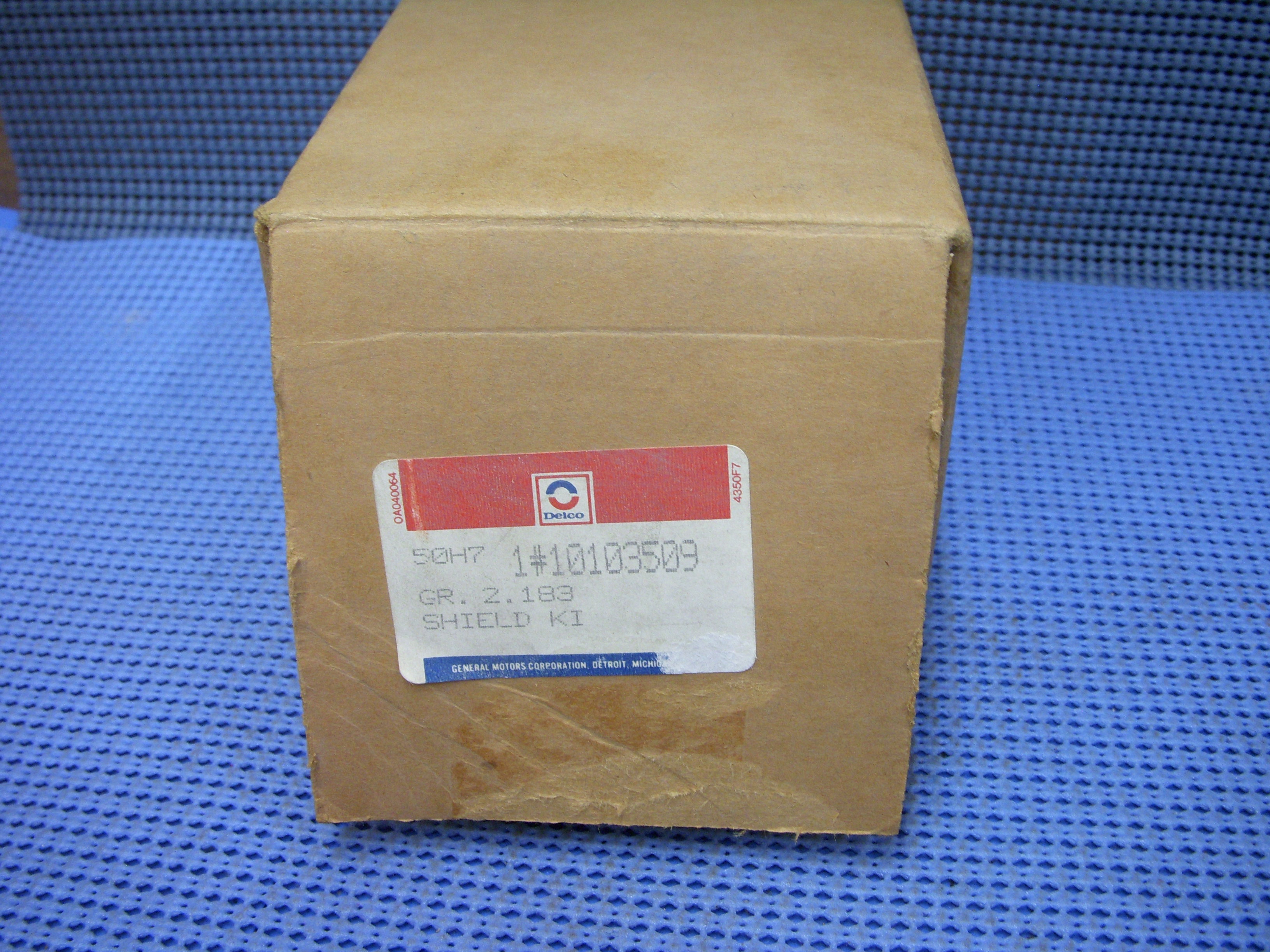 1987 GM Coil Wire Shield NOS # 10103509