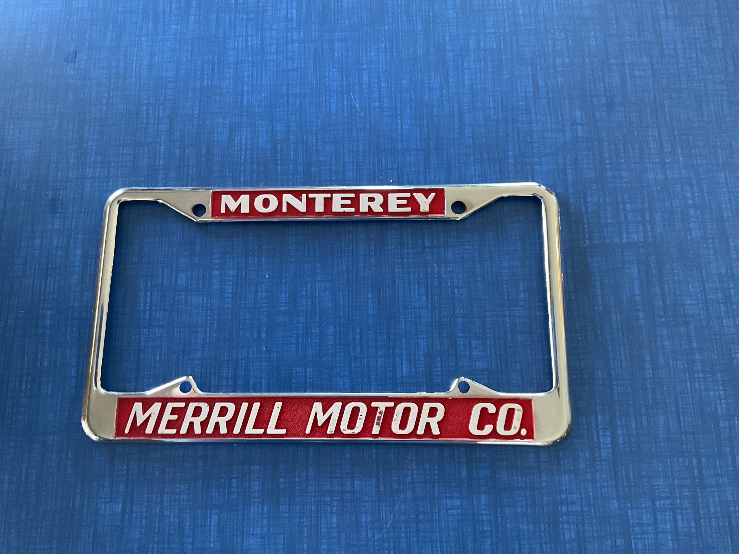 Vintage Monterey, California Merrill Motor Company Dealership License Plate Frame Oldsmobile